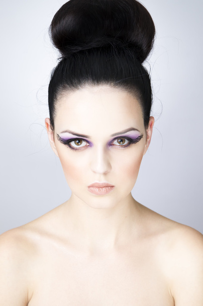 Professional makeup and hairstyle beautiful young woman close up - Foto, imagen
