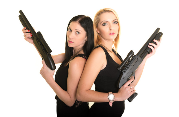 Duas mulheres bonitas com armas
 - Foto, Imagem