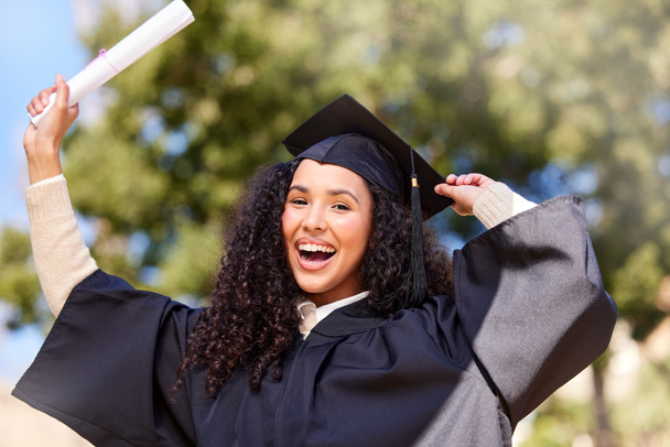 Portrait of a young woman cheering on graduation day. - Photo, image