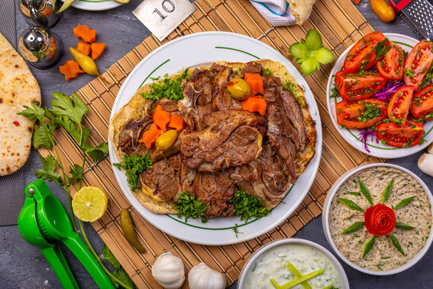 Oriental Barbeque & Kabab with different Salads  with golden bread - 写真・画像