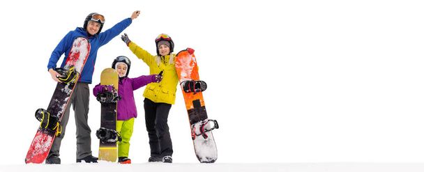 スノーボードの白い背景の上にカメラを見ての幸せな家族の肖像画 - 写真・画像