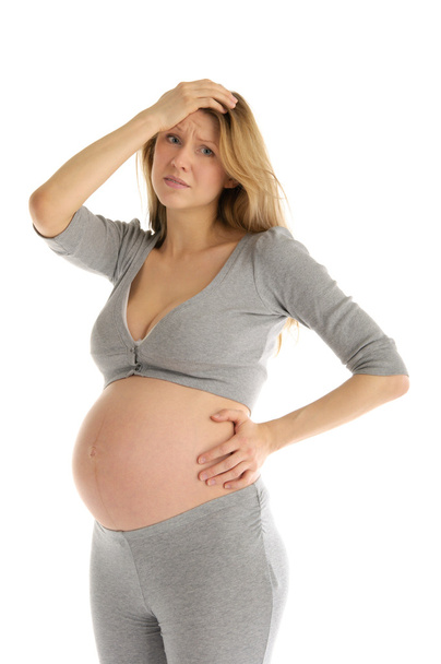 Offended pregnant woman in gray suit - Foto, imagen