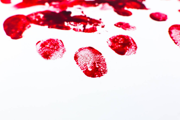 Red Bloody fingerprints on the white background. Horror and crime scene concept. Halloween postcard. - Zdjęcie, obraz