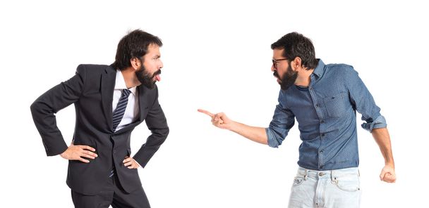 Person angry with his brother over white background   - Foto, imagen