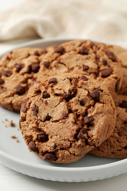 Delicious chocolate chip cookies on plate, closeup - Photo, Image
