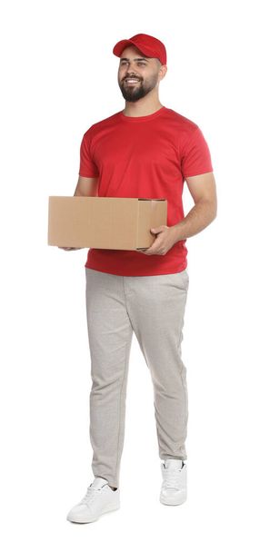 Courier holding cardboard box on white background - Photo, image