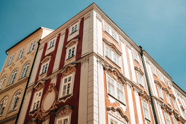 Prague, Czech Republic - July 2022. Amazing european architecture, historical facades of baroque styled building. Beautiful street in old town. . High quality photo - 写真・画像