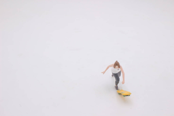 the mini figure ready to play Tipped Up Skateboard - Fotografie, Obrázek