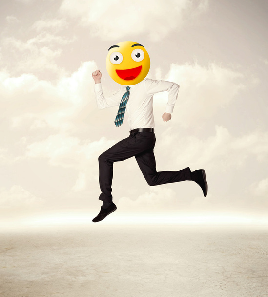 businessman wears yellow smiley face - Photo, Image