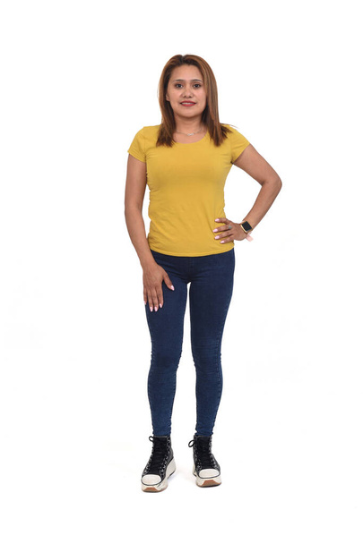 front view of woman with slim jeans on white background - Photo, Image