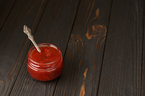homemade strawberry jam in jar - Фото, изображение
