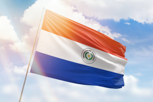 Sunny blue sky and a flagpole with the flag of paraguay - Photo, Image