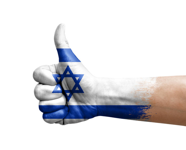 Hand making thumb up painted with flag of israel - 写真・画像