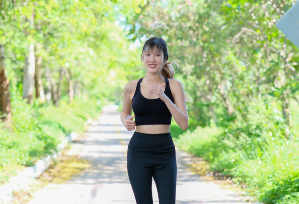 young Asian beautiful woman at workout outdoors  - Foto, Imagen