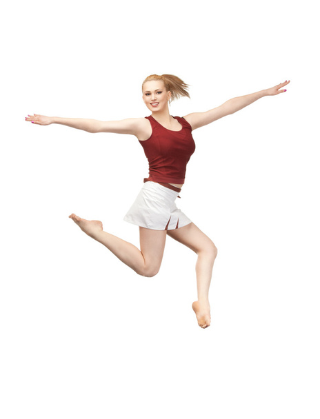 Jumping sporty girl - 写真・画像