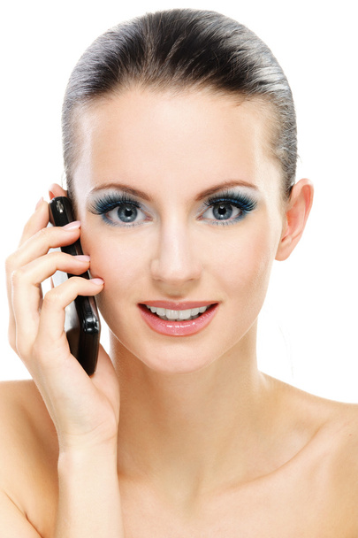 Mujer habla por teléfono móvil
 - Foto, imagen