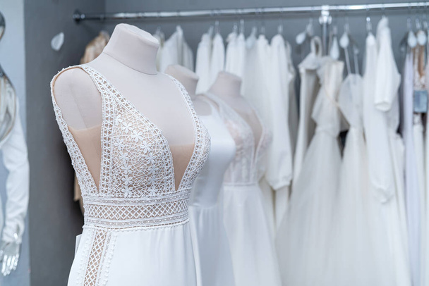 Fashion wedding dresses trends in bridal boutique - Fotografie, Obrázek