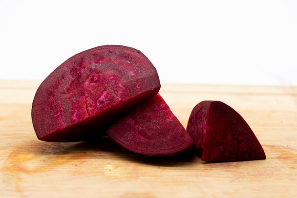 Beet also known as beetroot slices isolated on white background with clipping path - Foto, afbeelding