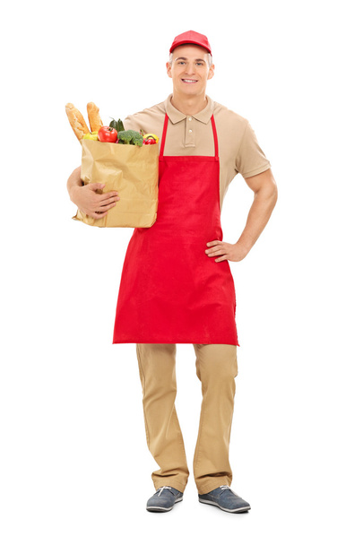 Market vendor with groceries bag - Фото, зображення