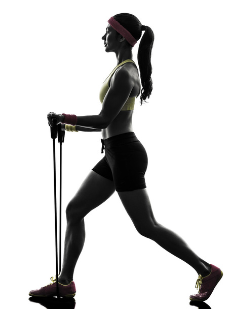woman exercising fitness workout resistance bands silhouette - Foto, immagini