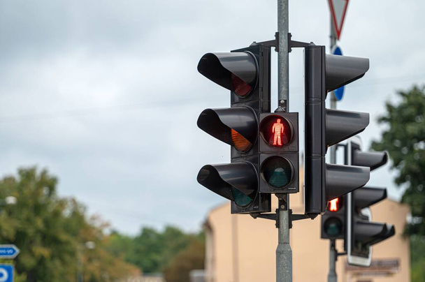 A red pedestrian light on a traffic light - Fotó, kép