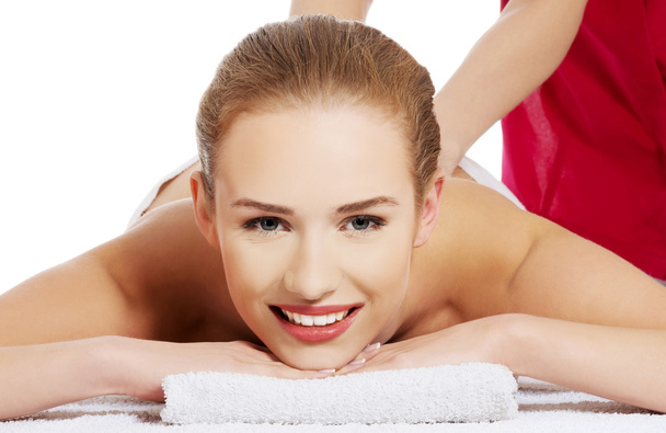 Woman getting massage in spa - Foto, afbeelding