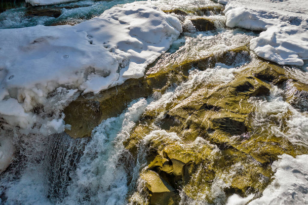 Winter Probiy waterfall closeup on the Prut River, in Yaremche, Ivano-Frankivsk region, Carpathian mountains, Ukraine. - Photo, Image