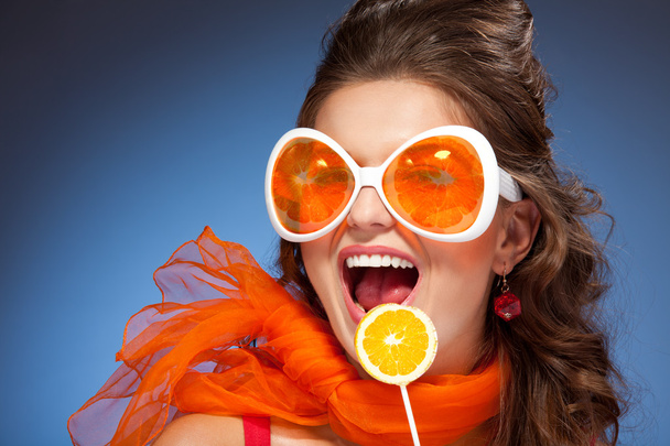 Woman with citrus lollipop - Zdjęcie, obraz