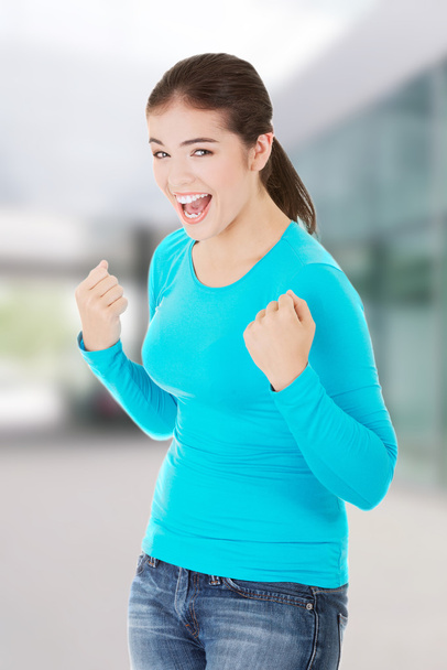 Excited happy success young woman with fists up - Foto, immagini