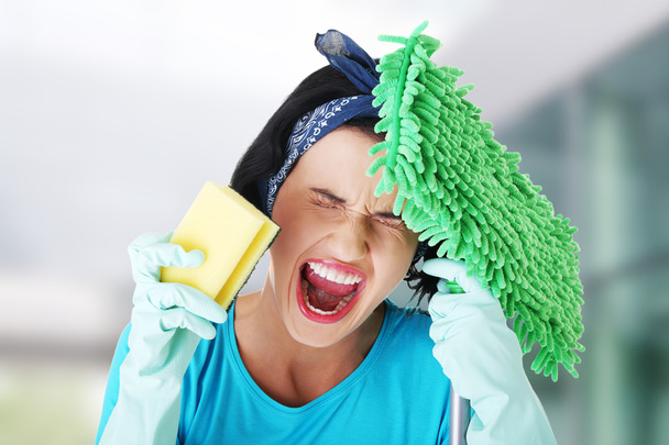 Tired and exhausted cleaning woman screaming - Fotografie, Obrázek