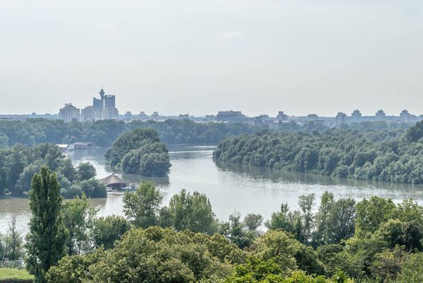Belgrade, Serbia - July 29, 2014: The Old Fortress on Kalemegdan in the capital of Serbia, Belgrade. A panoramic view of the confluence of the Sava River and the Danube River. - Fotografie, Obrázek