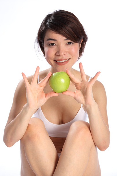 Beautiful girl holding green apple - Foto, Bild