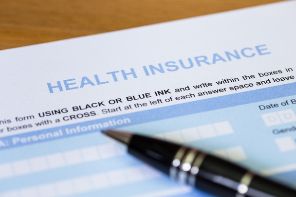 Formulario de solicitud de seguro de salud con concepto de pluma para plan de vida
 - Foto, Imagen