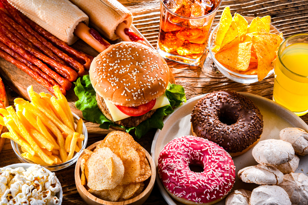 Foods enhancing the risk of cancer. Junk food - Foto, afbeelding