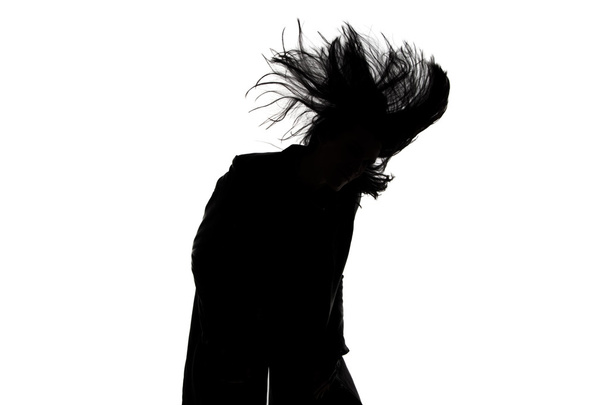 Зображення силуету чоловіка з дме волоссям
 - Фото, зображення