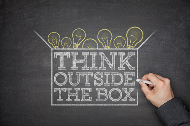 Think outside the box concept on blackboard - 写真・画像
