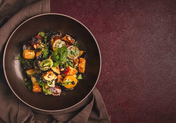 Warm Salad, Saksuka, with crispy eggplant, and tomatoes, spices, herbs, sesame seeds, sunflower seeds, Turkish cuisine, no people, - Fotoğraf, Görsel