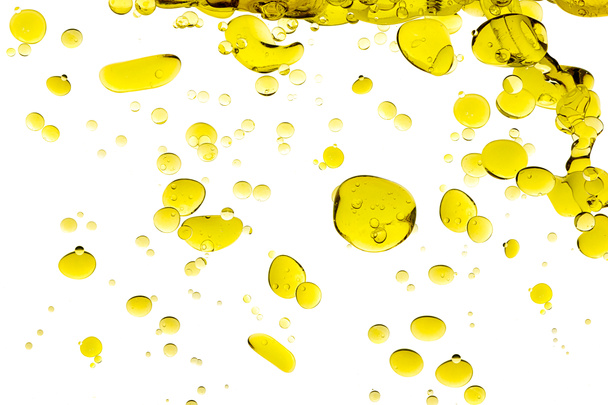 Gocce di Olio di Oliva Isolate su Bianco
 - Foto, immagini