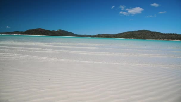 Whitehaven Beach with small waves on the shoreline on a sunny day, Australia - Footage, Video