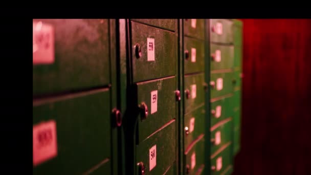 Mailboxes in a residential building. Lots of mailboxes in the entrance of a large house. Place of receipt of letters and parcels. Sending messages between people. Delivery of mail to the house. - Video, Çekim