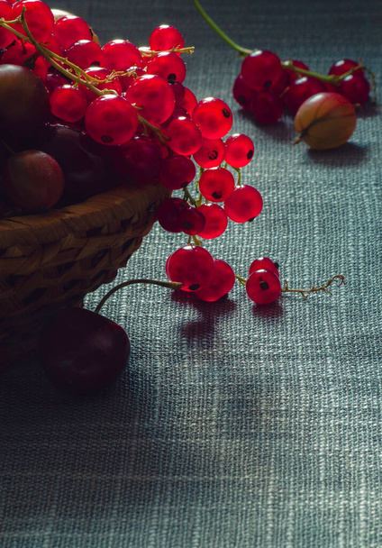 fresh ripe berries on gray background. - Photo, image
