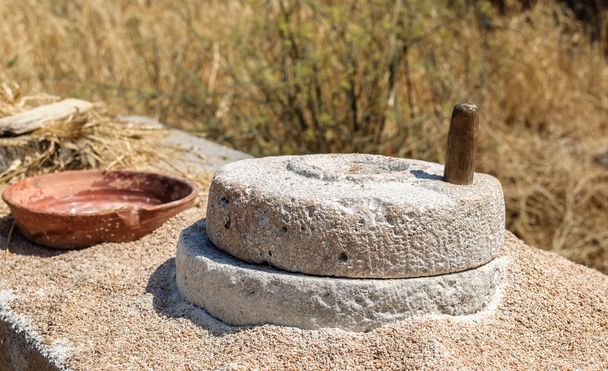 Greek ancient, stone, hand grain mill. - Photo, Image