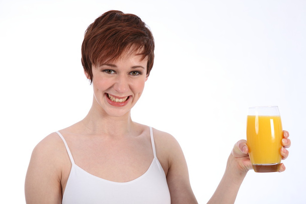 Woman with glass of orange juice - Φωτογραφία, εικόνα