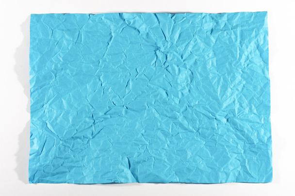 Wrinkled blue A4 sheet of paper isolated - Fotografie, Obrázek