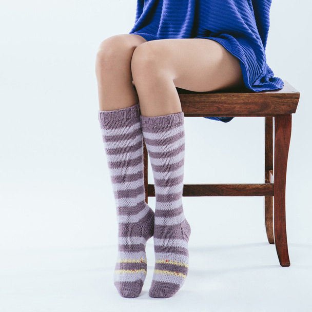 Fashionable girl in knitted socks - Foto, Bild