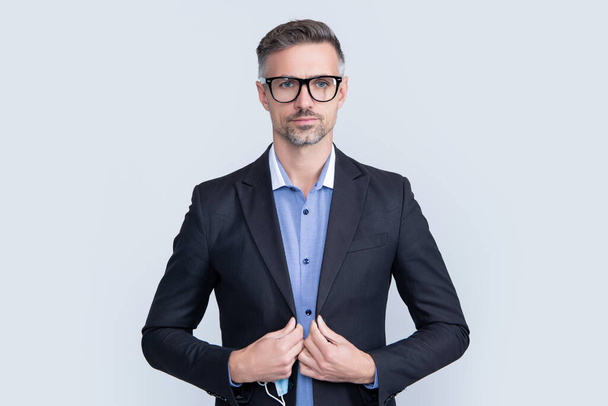 mature lawyer wearing glasses and business suit. - Fotó, kép