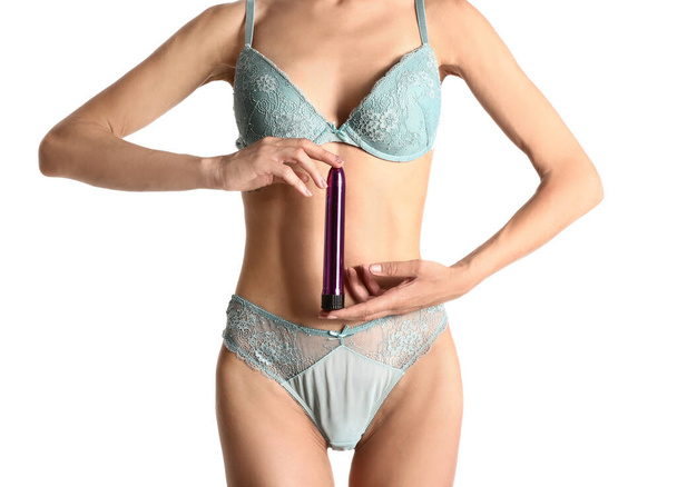 Seksikäs nuori nainen vibraattori valkoisella taustalla - Valokuva, kuva