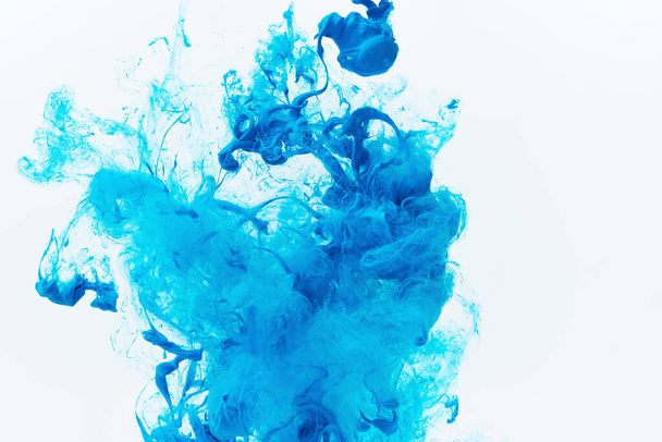 Mixed ink dynamic abstract background with splash of acrylic paint in water. Flowing acrylic backdrop picture - Фото, изображение