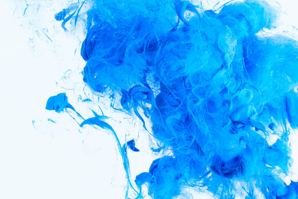 Mixed ink dynamic abstract background with splash of acrylic paint in water. Flowing acrylic backdrop picture - 写真・画像