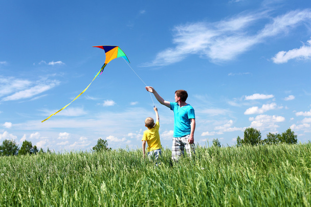 Father with son in summer with kite - Zdjęcie, obraz